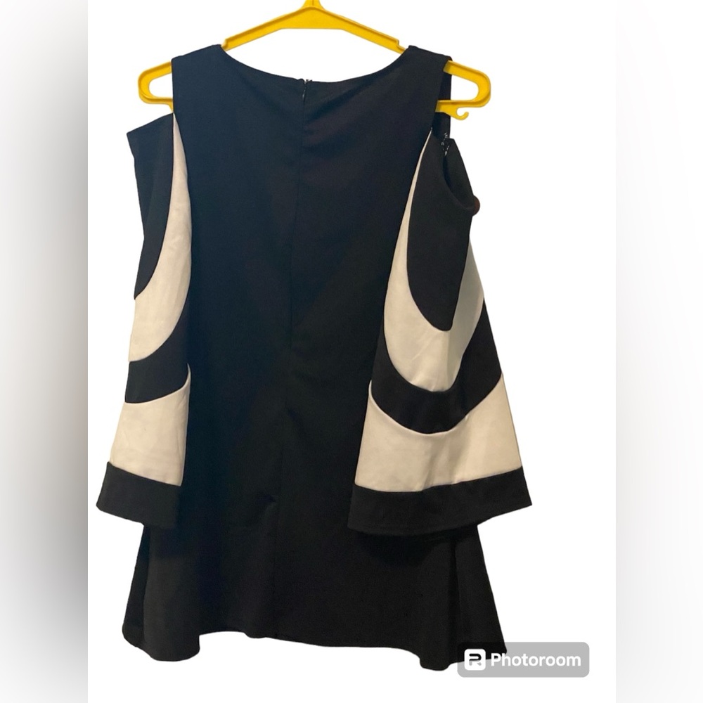 Black and white dress with hidden zipper in the back of the dress